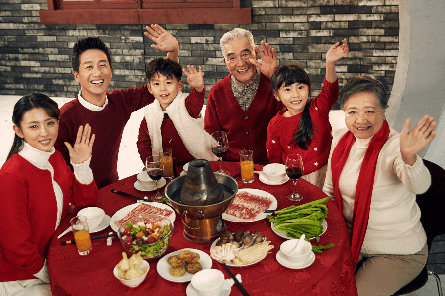 lucky Chinese New Year foods during a traditional Spring Festival reunion dinner in China